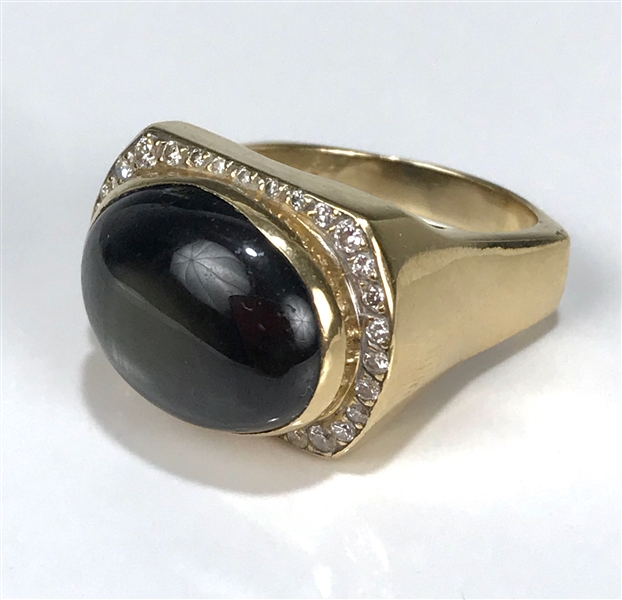 Elvis Presley Owned Gold Ring with Large Black Star Sapphire Stone and 32 Diamonds Gifted to Memphis Mafia Member Charlie Hodge