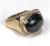 Elvis Presley Owned Gold Ring with Large Black Star Sapphire Stone and 32 Diamonds Gifted to Memphis Mafia Member Charlie Hodge