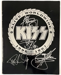 1996-97 KISS Alive Worldwide Tour Program Signed by all Four Members on the Cover – Paul Stanley, Gene Simmons, Ace Frehley and Peter Criss