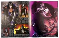 1996-97 KISS Alive Worldwide Tour Program Signed by all Four Members on the Cover – Paul Stanley, Gene Simmons, Ace Frehley and Peter Criss