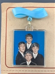 1964 Beatles Set of 12 Lapel Pins with Group Portraits – Mint on Display Card!