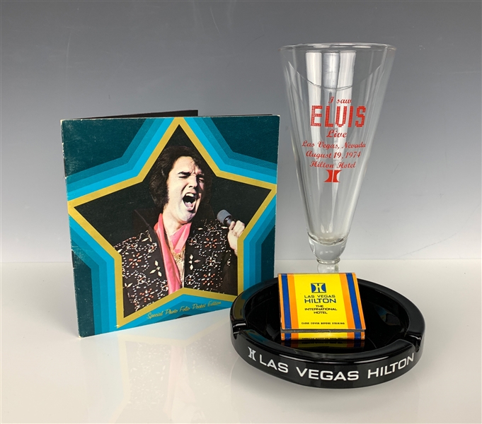 Elvis Presley August 1974 Opening Night Glass From The Las Vegas Hilton, Plus Mini Photo Booklet, Hilton Ashtray and Matchbox