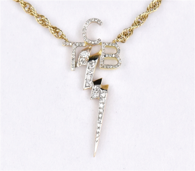1970s Elvis Presley Owned and Worn Diamond  Encrusted “TCB” Necklace Given to Detective  John O’Grady