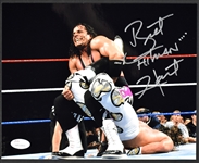 Collection of Nine Wrestling Superstars Signed 8x10s Incl. Hulk Hogan (9) (BAS)