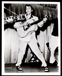 Group of Eight 1956 Elvis Presley Promotional Photos – The “Tonsils” Photo