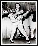 Group of Eight 1956 Elvis Presley Promotional Photos – The “Tonsils” Photo