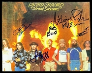 Lynyrd Skynyrd Band-Signed Photo and Lyric Sheet with Free Bird Inscription (BAS)
