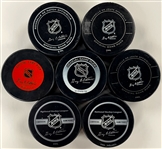 Chicago Blackhawks Signed Official NHL Game Puck Group of 16 Incl. Bobby Hull, Tony Esposito, Denis Savard and Others (BAS)