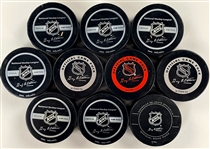 Chicago Blackhawk Signed Game Puck Group of 10 Incl. Bobby Hull and Others (with Duplicates) (BAS)
