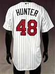 Torii Hunter Signed 2005 Minnesota Twins Game Issued Rawlings Bat and Signed Minnesota Twins Jersey  (Beckett Authentic) Acquired by Teammate Juan Castro