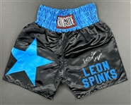 Leon Spinks Your Champ! Signed Boxing Trunks and Boxing Gloves (5) (Beckett Authentic)