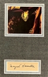 <em>Wizard of Oz</em> Signature Display Incl. First Edition <em>The Wonderful Wizard of Oz</em> with Judy Garland, Bert Lahr, Jack Haley, Ray Bolger, Margaret Hamilton and Buddy Ebsen (JSA)